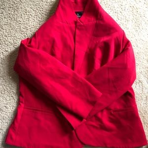 Women’s blazer. Imperfection on shoulder pictured. Has padded shoulders.